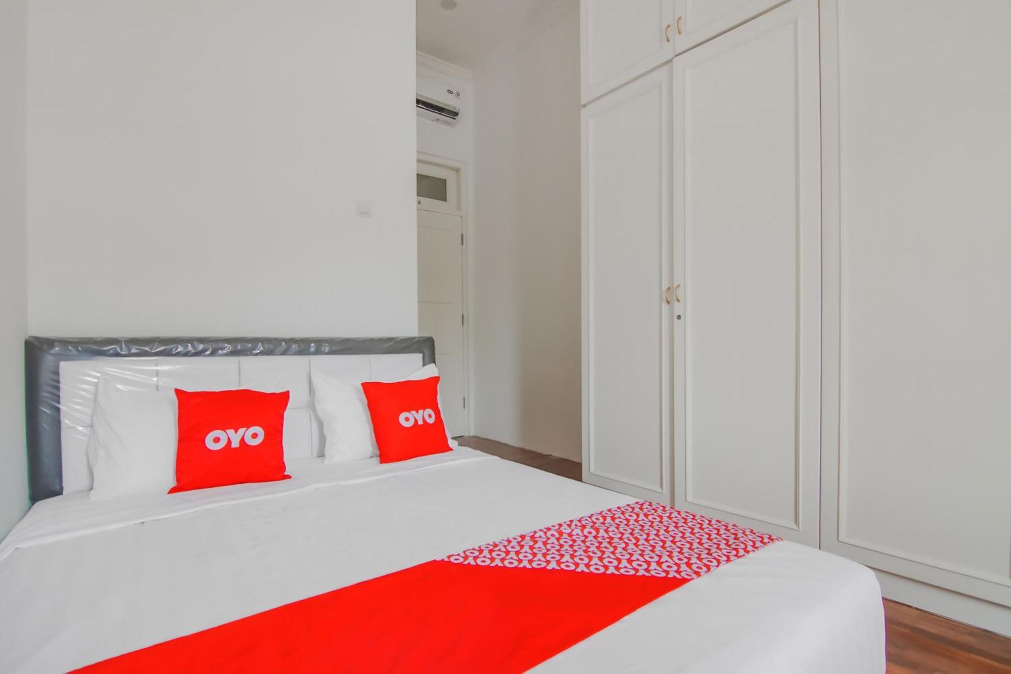 Super Oyo Capital O 90342 Kemang Garden Hotel Jakarta Buitenkant foto
