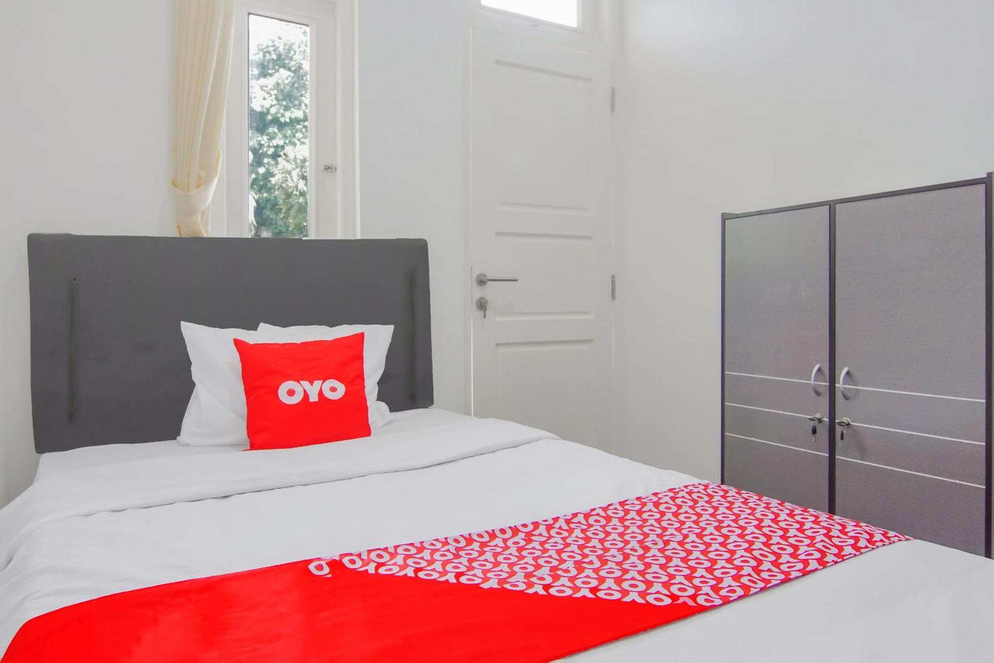 Super Oyo Capital O 90342 Kemang Garden Hotel Jakarta Buitenkant foto
